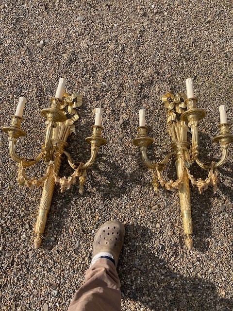 A fine and large pair of gilt bronze sconces