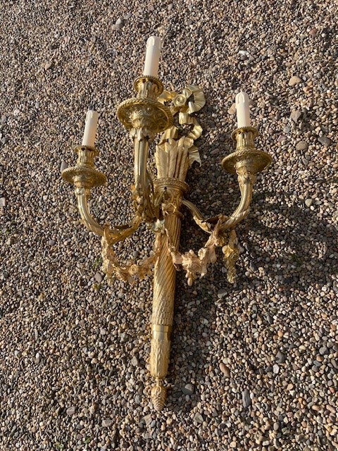 A fine and large pair of gilt bronze sconces