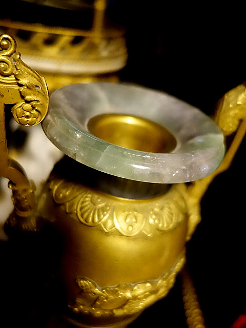A pair of gilt bronze and spath fluor vases