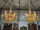 A palatial size pair of gilt bronze Louis XIV chandeliers 