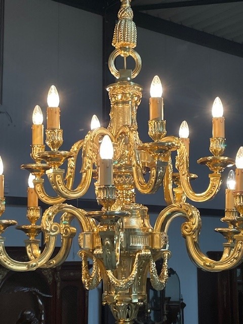 A palatial size pair of gilt bronze Louis XIV chandeliers 