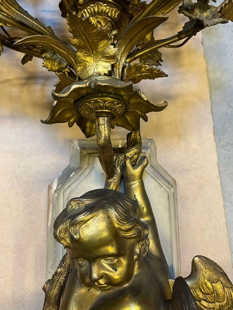 A palatial size pair of wall lights 