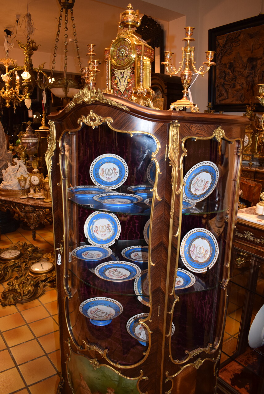 A suite of 17 porcelain Sèvres pieces