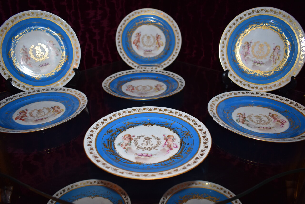 A suite of 17 porcelain Sèvres pieces