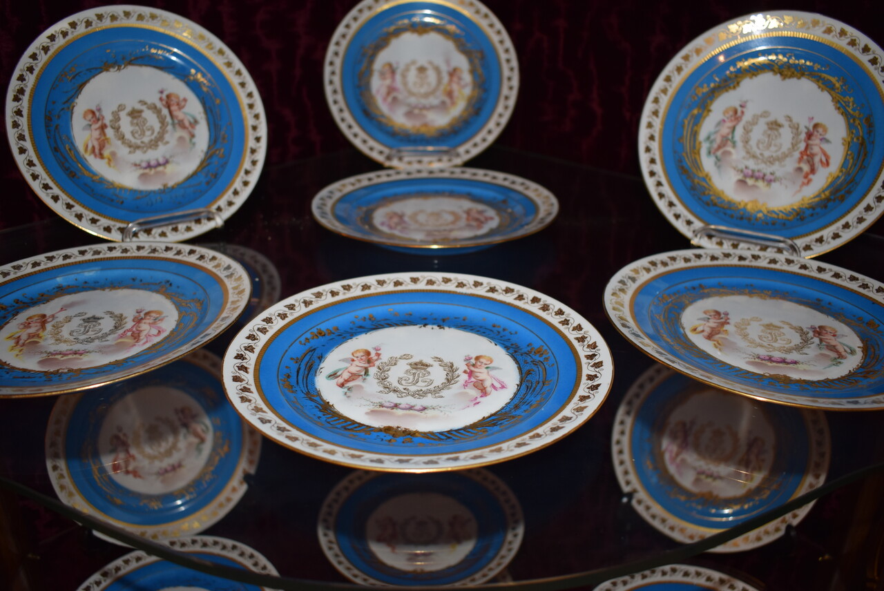 A suite of 17 porcelain Sèvres pieces