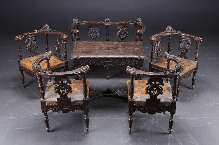 A walnut six piece salon suite with table, nicely carved