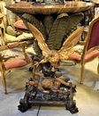 Console Table Carved and Polychromed Wood Shell shaped Top Uwith Eagle Attacking Bear and Ferns Austria or Italy 19th Century