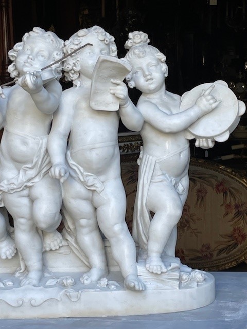 marble group depicting five putti musicians 
