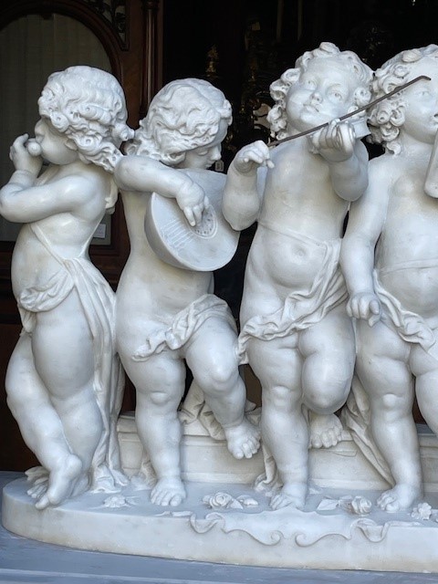 marble group depicting five putti musicians 