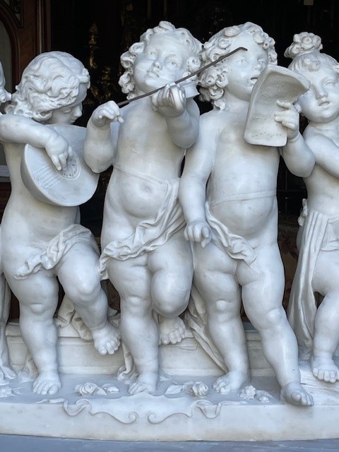 marble group depicting five putti musicians 