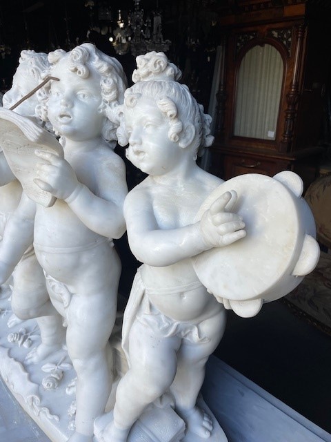 marble group depicting five putti musicians 