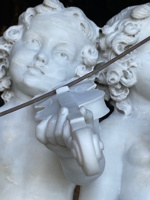 marble group depicting five putti musicians 