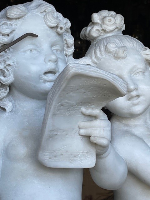 marble group depicting five putti musicians 