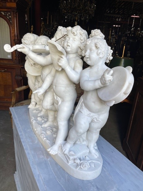 marble group depicting five putti musicians 
