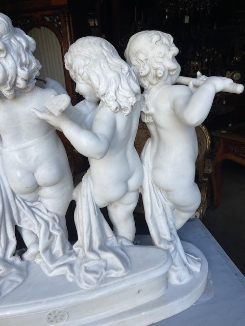 marble group depicting five putti musicians 