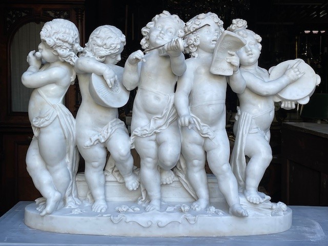 marble group depicting five putti musicians 