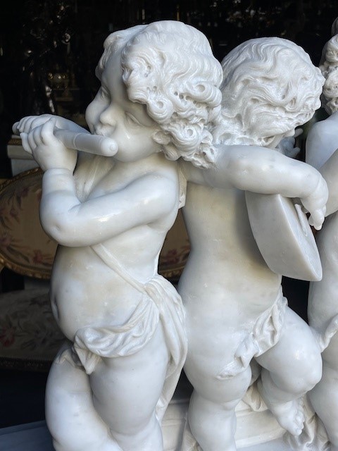 marble group depicting five putti musicians 