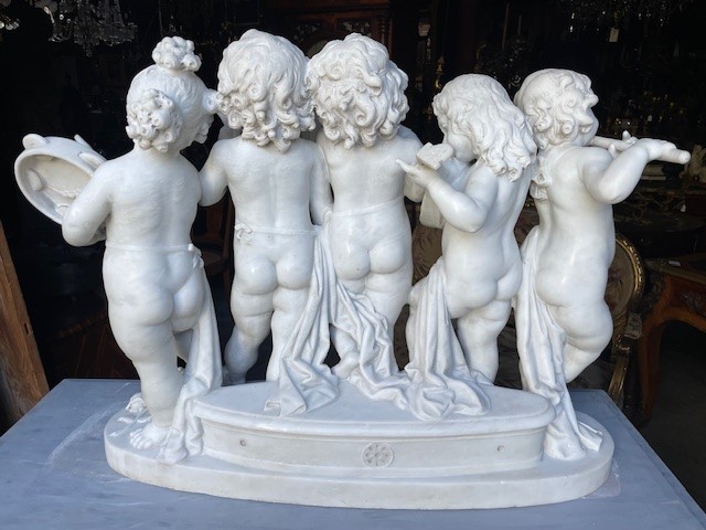 marble group depicting five putti musicians 