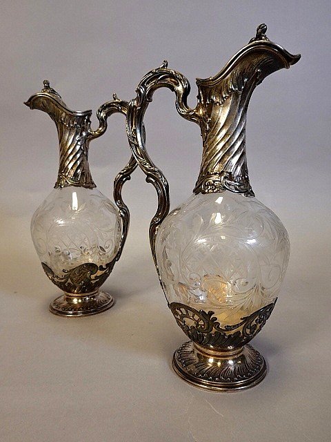 Pair of solid silcer and crystal ewers